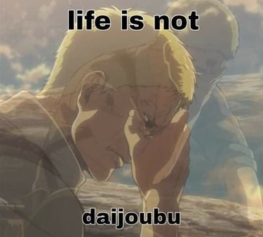 Reiner Braun with his head in his hands. Captioned life is not daijoubu