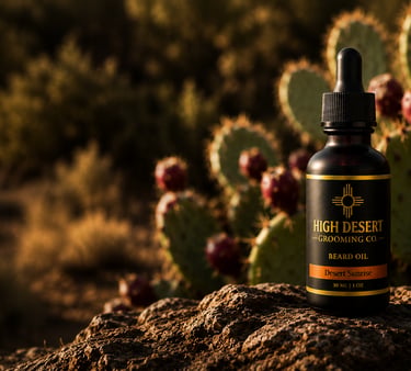 High Desert Grooming Co. beard oil bottle on a desert rock with prickly pear cactus in the background.