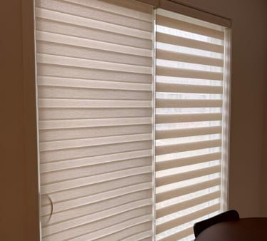 a dining room with a table and chairs