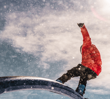 a man on a snowboard in the snow