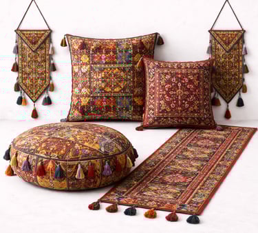 Tribal textile décor with ethnic embroidery, tassels, and traditional woven designs.