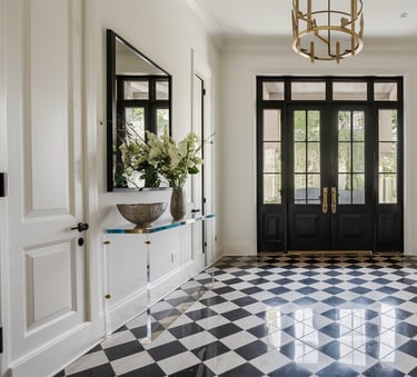 a black and white checkered floor plan with a bench and a bench