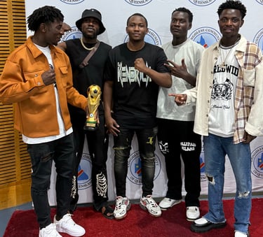 a group of men standing around a trophy