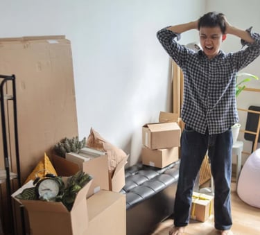 stressed during move with unpacked boxes needing organized