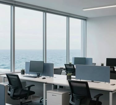 A minimalist North American / US office interior with large windows. The scene features clean lines, white desks, and ocean blue accents. The atmosphere is calm and highly organized, emphasizing precision and professional efficiency.