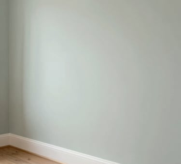 A close-up of high-quality interior finishes, showing a perfectly plastered wall meeting a wooden floor, soft warm lighting, professional craftsmanship, featuring #BBA99C and #F2ECE7 tones.