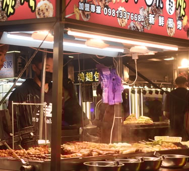 Puesto en mercado nocturno de Taipei