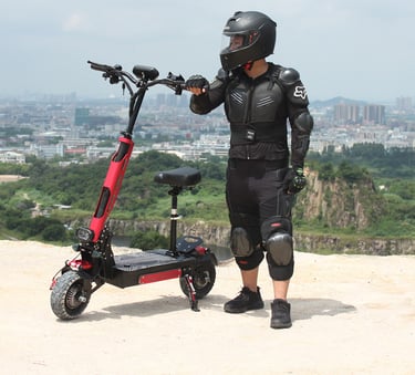 a man in a helmet and knee pads on a scooter