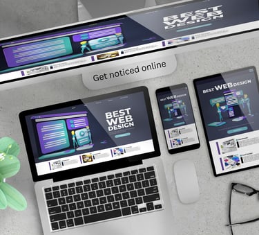 a laptop computer and a laptop computer sitting on a desk