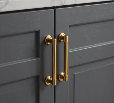 A close-up photograph of high-end custom cabinetry with charcoal finishes and gold hardware, showcasing premium South Asian craftsmanship in a luxury Islamabad home.