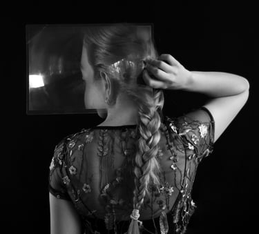 Surreal self-portrait by Anita Papp, magnified and distorted using a magnifying sheet, evoking theme