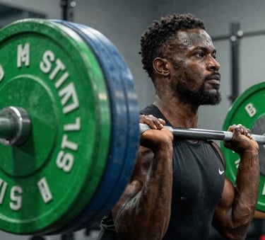 A close-up photograph of a focused athlete performing a deadlift with professional weights in a high-end gym in Abuja, West African / Nigerian setting, moody lighting with electric green and dark grey tones.