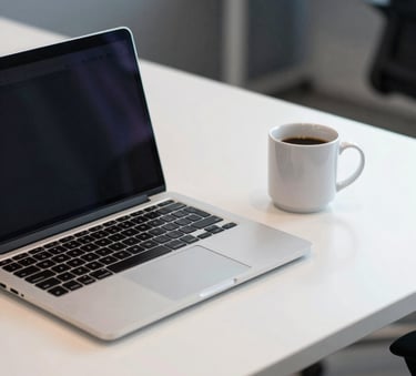 a modern South American / Brazilian office setup with a laptop and a coffee mug on a pristine desk, off-white and slate blue tones, clean aesthetic