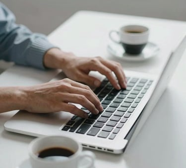 A close-up shot of a professional typing on a high-end laptop next to a cup of espresso on a minimalist white desk. The lighting is crisp and clear, conveying efficiency. Palette highlights #1C2B3C and #F5F8FA.