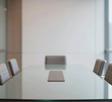 A high-end, modern meeting room with a clean glass table, featuring soft lighting and a professional atmosphere. Subtle accents of #1D3534 and #4A6D6B are integrated into the interior design.