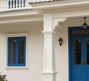 A beautifully finished South Asian / Indian home exterior, freshly painted in Soft Off-White with Classic Blue accents, showcasing premium finish and craftsmanship.