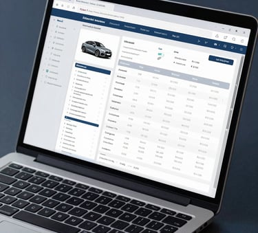 A close-up photograph of a professional laptop screen displaying a detailed car valuation report and financial documents on a clean desk, dark charcoal blue accents, professional lighting.