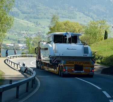 a truck with a tanker on the road