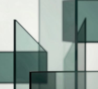 An abstract, sophisticated visualization of growth and structure, featuring geometric glass shapes and light reflections in sage #A9C2C0 and dark teal #1A2E2F tones against a bright background.