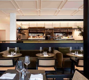 a restaurant with a bar and a bar with a bar