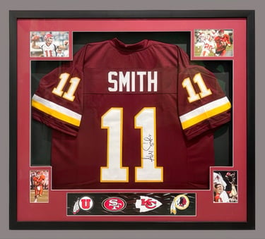 Alex Smith autographed framed football jersey with career highlights and team logos.
