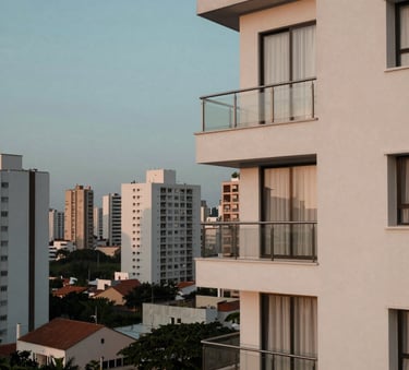 A serene view of a modern South American Brazilian residential apartment balcony overlooking a peaceful city skyline at dusk, capturing the essence of 'residence' with soft teal and off-white lighting.