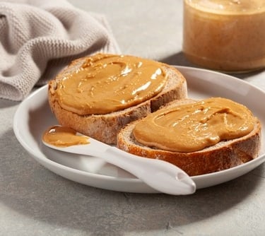 a peanut butter spread sandwhich