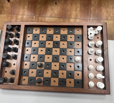 A chess board with tactile pieces 