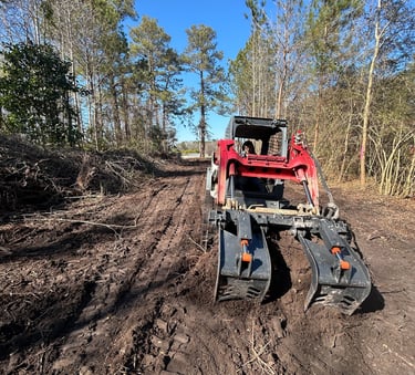 Excavation equipment clearing land in Holly Ridge NC