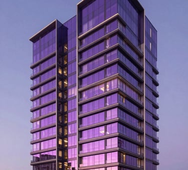Wide angle photography of a luxurious contemporary residential complex in Madrid. Sharp architectural lines, dusk lighting with elegant royal purple and neon fuchsia reflections on the glass facade. Iberian / Spanish high-end architecture. Premium minimalist feel.