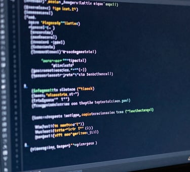 Abstract photography of a high-resolution monitor in a dark North American / US tech hub, displaying complex code structures with syntax highlighting in deep navy and ice white tones, shallow depth of field.