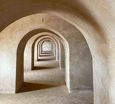 Sequence of arches in the historic fort Borj Addoumou (Salé), showing spatial continuity and light