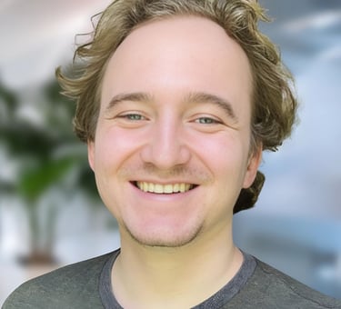 a man with a beard and a beard smiling