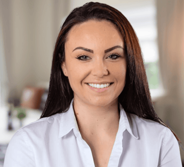 a woman with a smile on her face