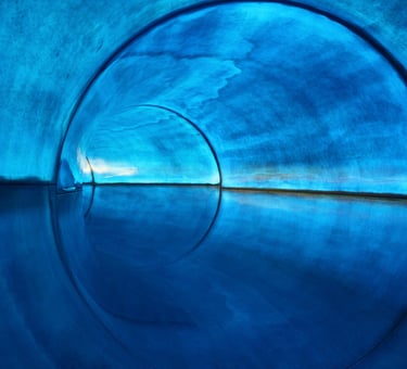 The inside of a waterslide.