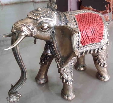 Side view of handcrafted brass elephant with red-painted back-Perfect for international delivery"