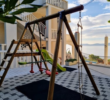 Children's swing and slide with Adriatic sea view, Easy Living Holiday Home, Lokva Rogoznica