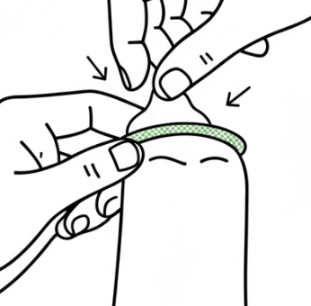 cartoon hand squeezing tip of condom above penis