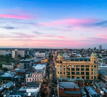 A drone image looking south down Chapel Street Precinct at sunrise