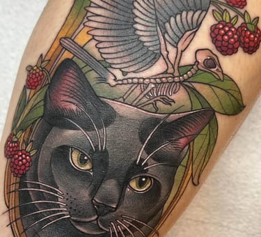 Bold neo-traditional tattoo with vibrant colors and thick outlines at Aura Tattoo Studios, Lewisvill