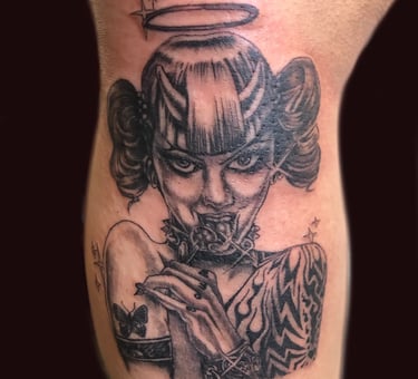 Black and grey realistic tattoo showcasing lifelike shading at Aura Tattoo Studios in Lewisville