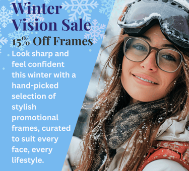 a woman wearing a winter hat and goggles with a snowboarder