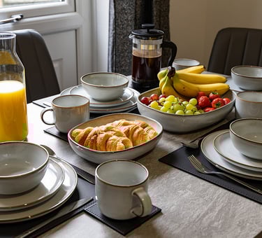 Dining area with crockery and untensils