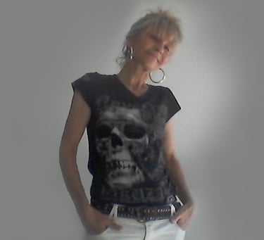 a woman in a black shirt and white pants