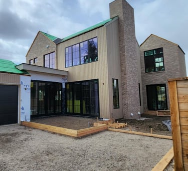 a house with a green roof and a green roof