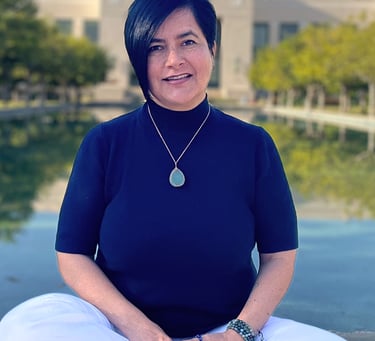 Raquel in a lotus pose, representing inner peace and emotional intelligence through RHM Life Coachin