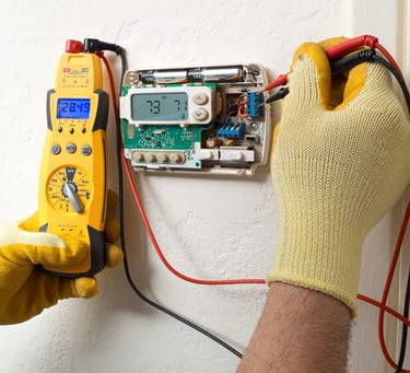 AC thermostat and wiring inspection by certified technician in UAE