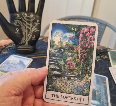 That wise old dude hand holding a tarot card in his reading room at Rudheath