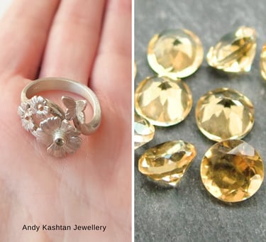 a person's hand holding a ring with a flower