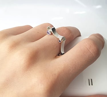 a person's hand holding a cell phone